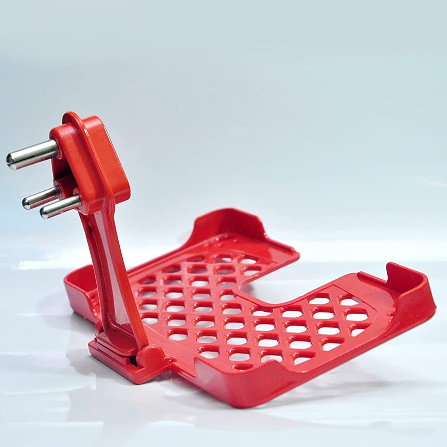 Red wall holder stand for mobile charging.