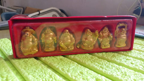 Golden Smiles: 6 Prosperity Buddha 6-Piece Collection